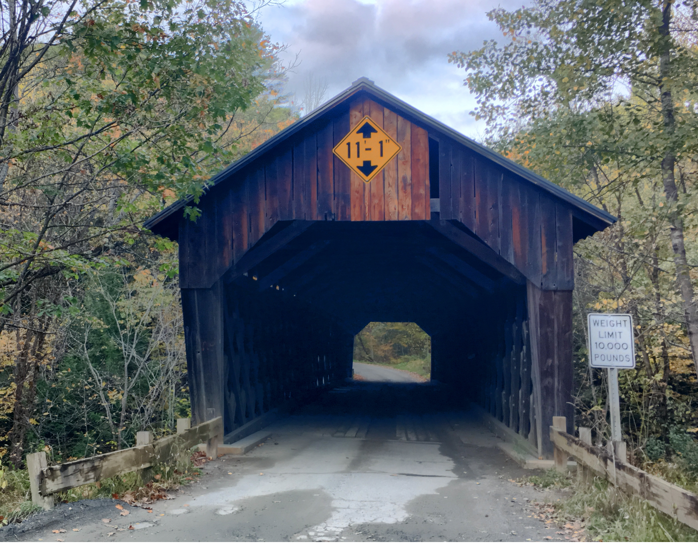 A picture containing outdoor, building, bridge, road

Description automatically generated